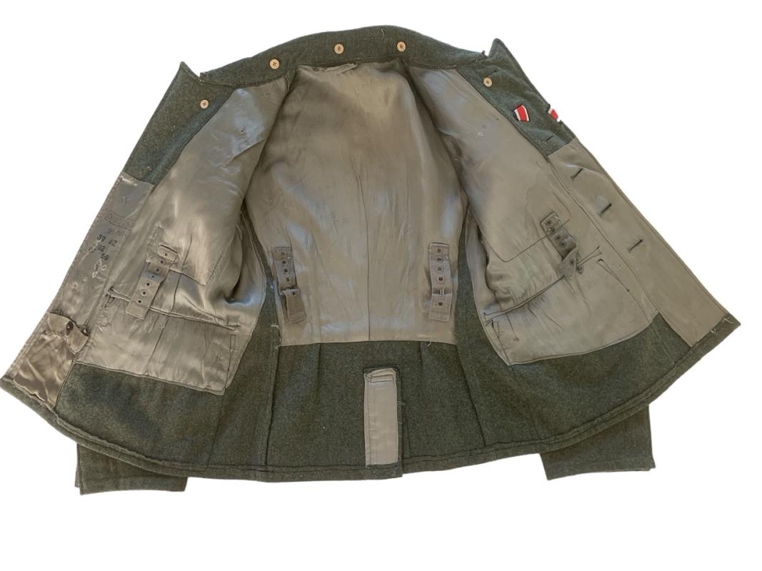 Wehrmacht Heer M43 field tunic With Original Applied Insignia