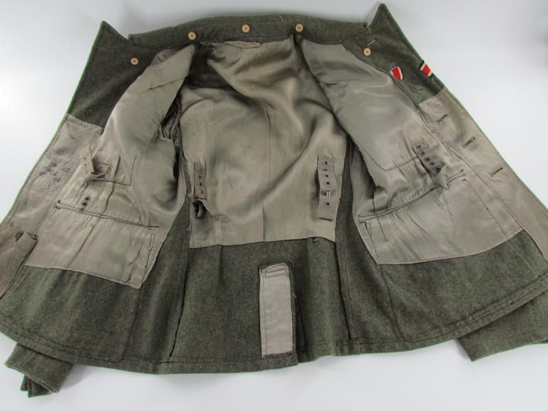 Wehrmacht Heer M43 field tunic With Original Applied Insignia