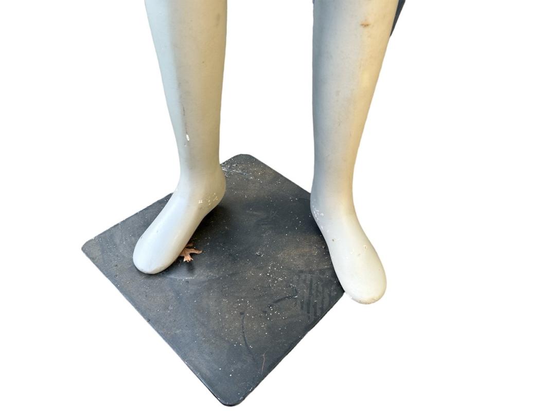 Vintage mannequin of a young boy