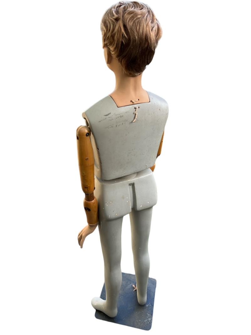 Vintage mannequin of a young boy