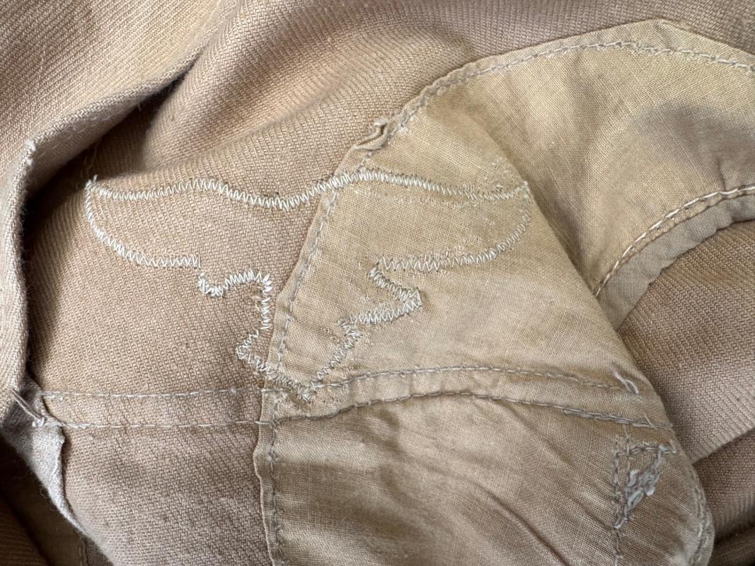 Luftwaffe 4 pocket tropical tunic with insignia, near mint condition