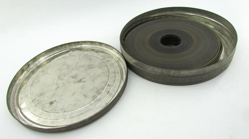 Large Film can with WWII 35mm film included