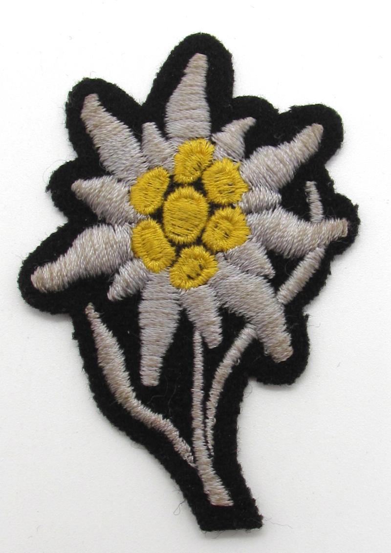 Waffen SS 'Gebirgsjäger' Edelweiss cloth cap badge
